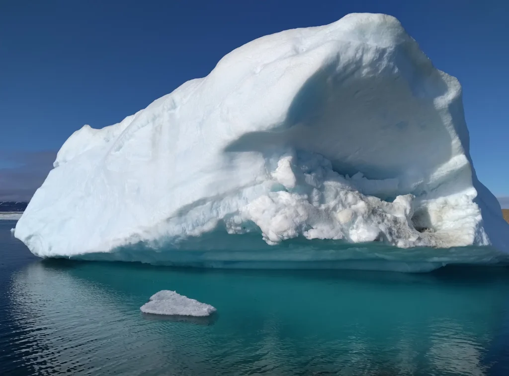 Large iceberg off the remote northern coast of Greenland during the 2026 scientific expedition.